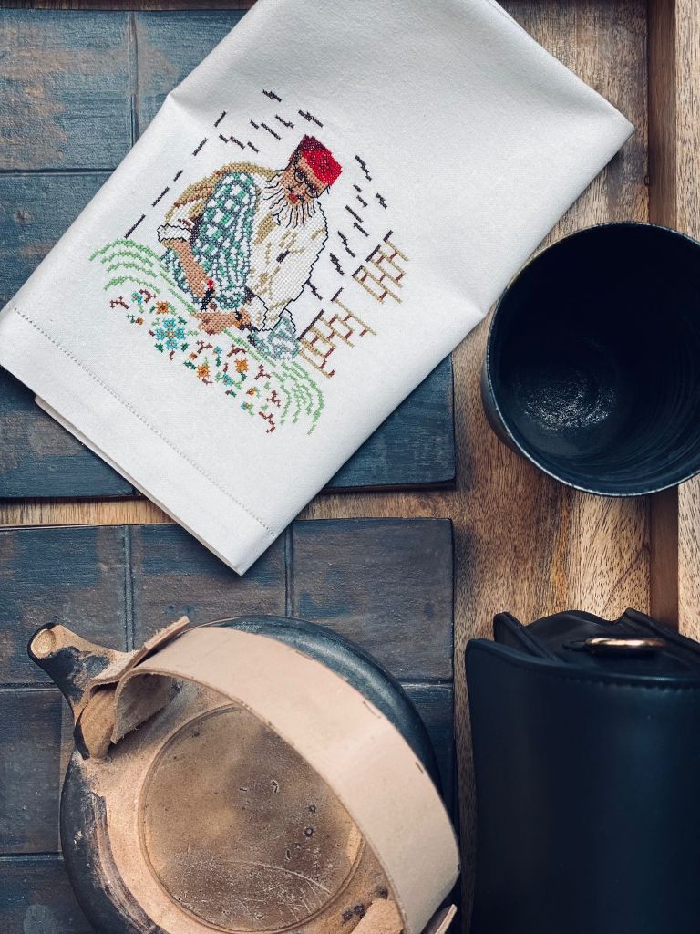 Single-thread cross-stitch guest towels, delicately hand-embroidered by women artisans in rural Andhra.