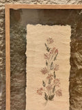 Wildflowers hand pressed on raw paper