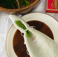 The upright Dandelion dinner napkins